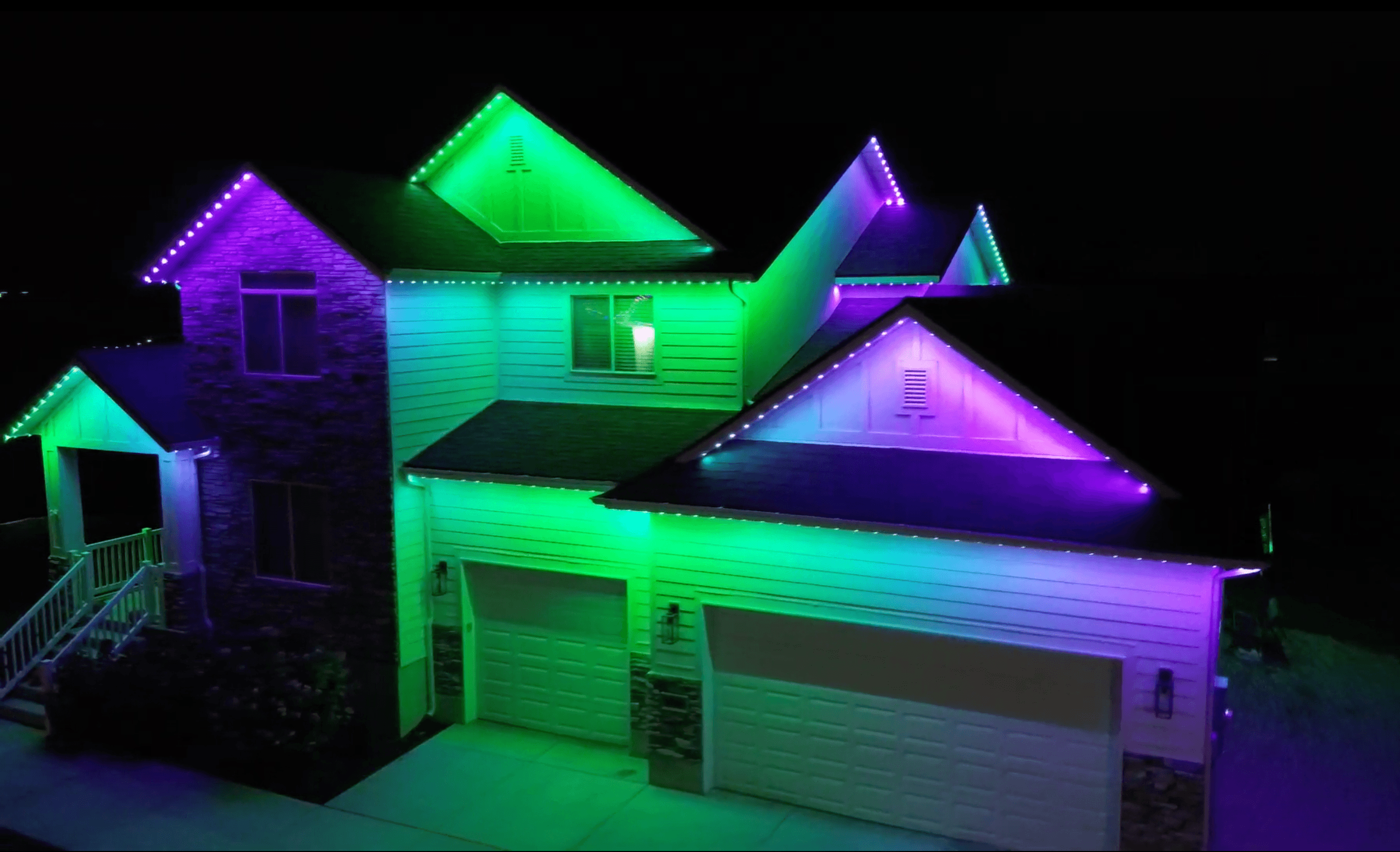 Permanent holiday lighting in orange and purple for Halloween, a TruLight network installation
